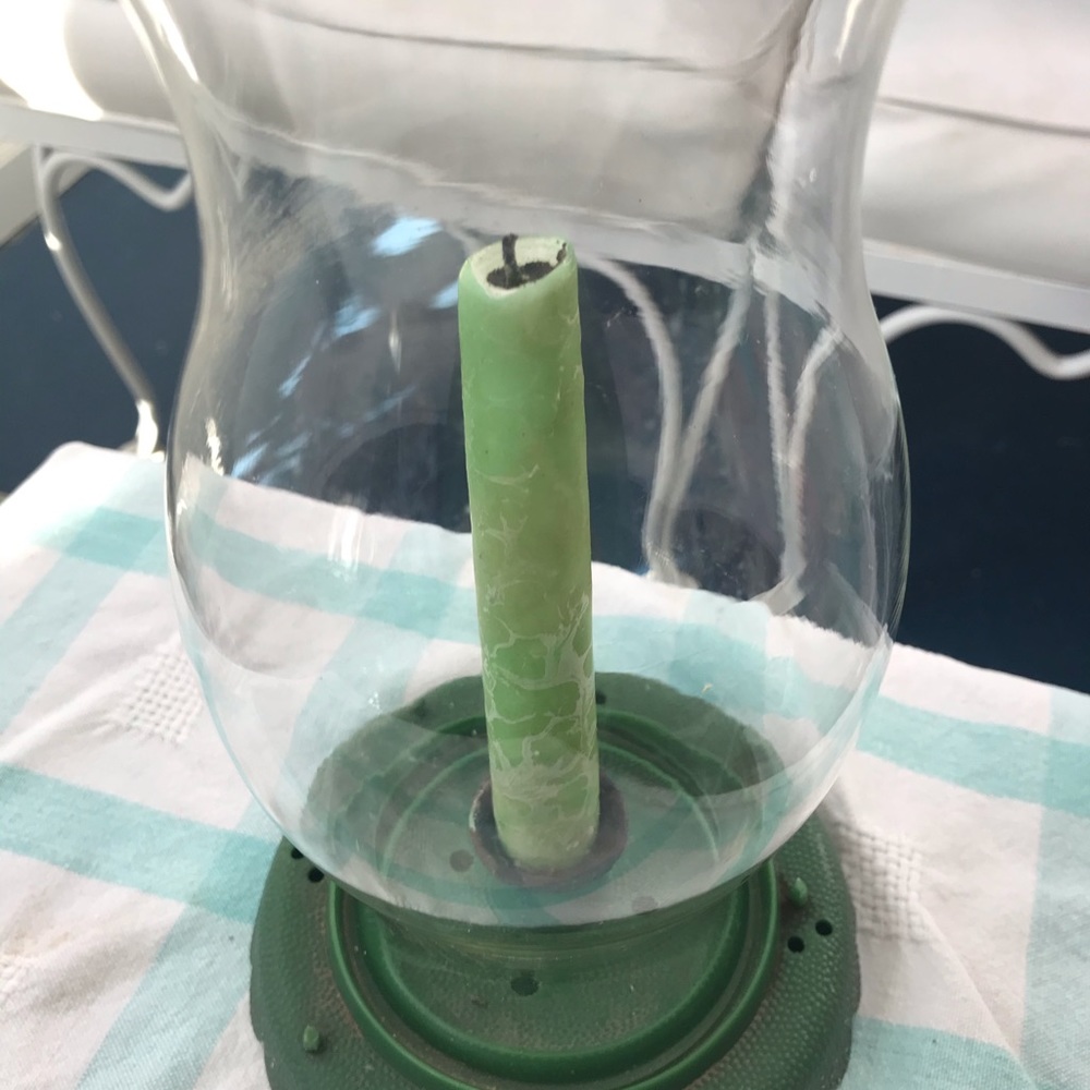 Very 60’s avocado colored hurricane lamp